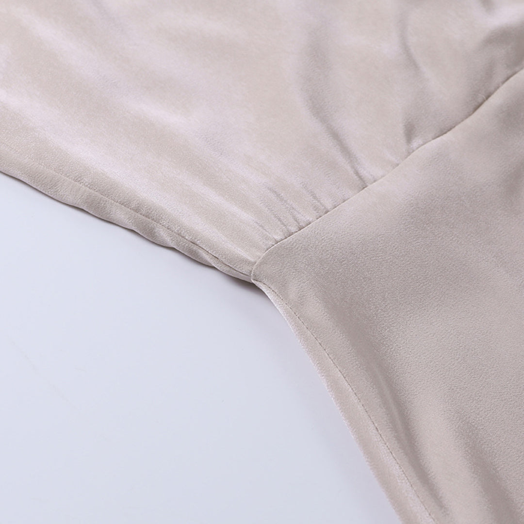 Sahari – Elegante midi-jurk met ruguitsnijding